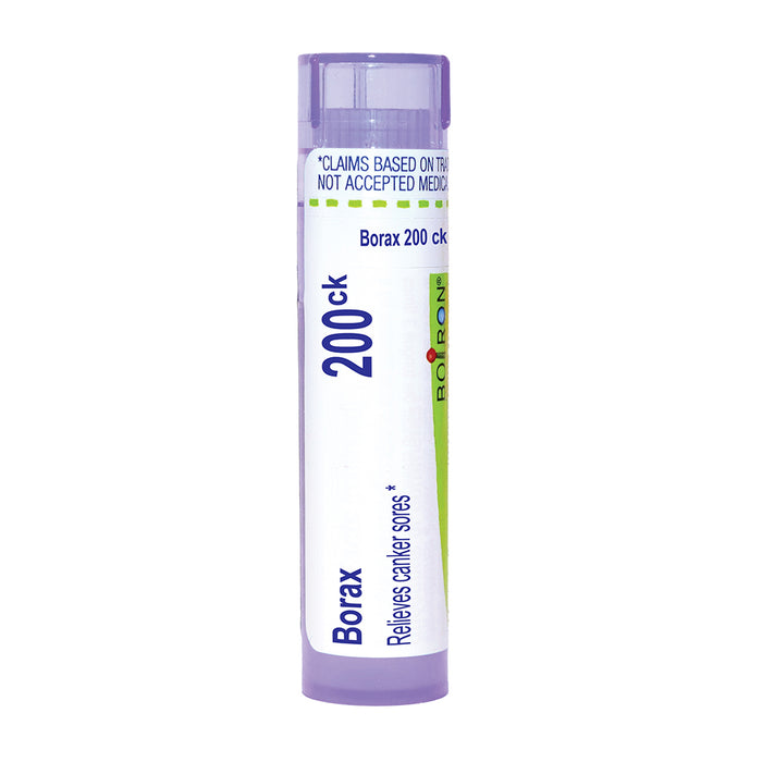 A single tube of Borax 200 ck relief for canker sores, featuring a white label with purple and green accents, set against a plain white background.