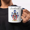 Murison 11 oz Scottish family crest ceramic mug showing a Scotland-topped heraldic emblem
