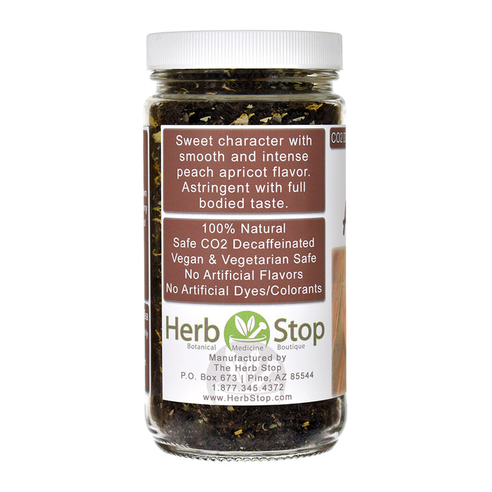 Jar of Peach Apricot Decaffeinated Black Tea with a label on a white background
