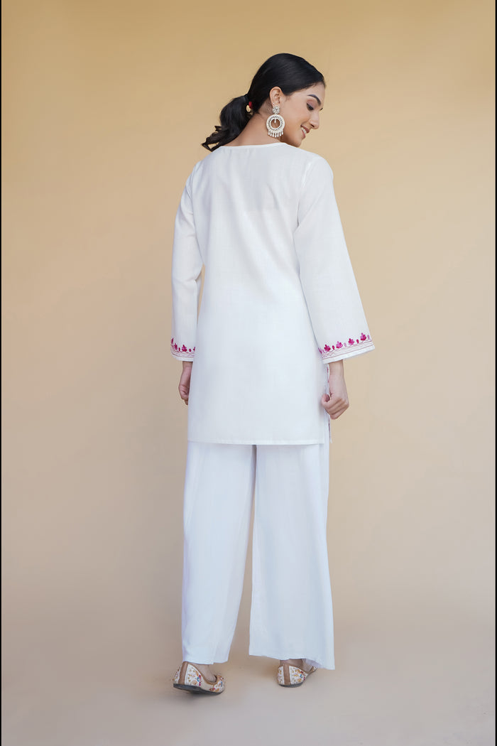 Reshika in Kashmiri Aari Work Cotton Short Kurta – White