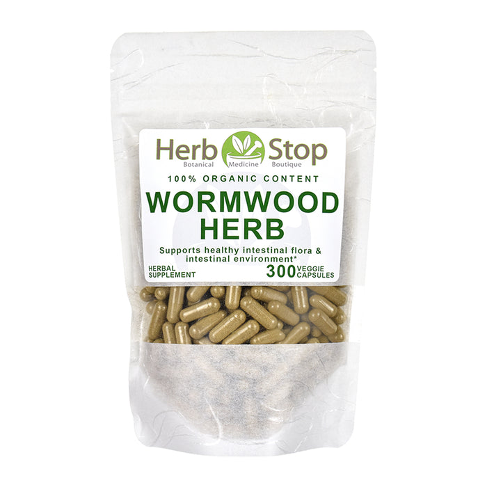 Organic Wormwood Capsules in a bag on a white background